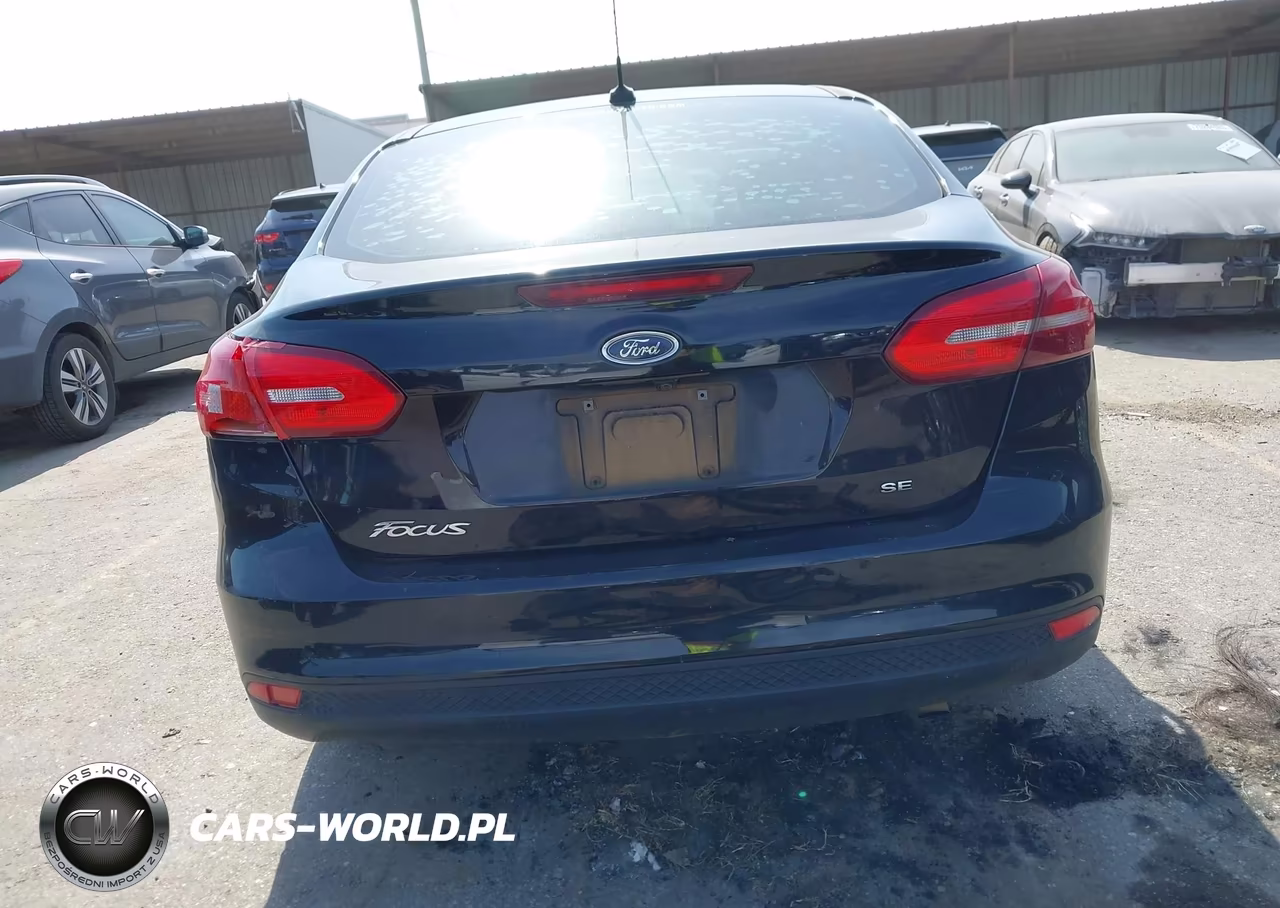 2018 Ford Focus Se VIN:1FADP3F2XJL201403 - 16