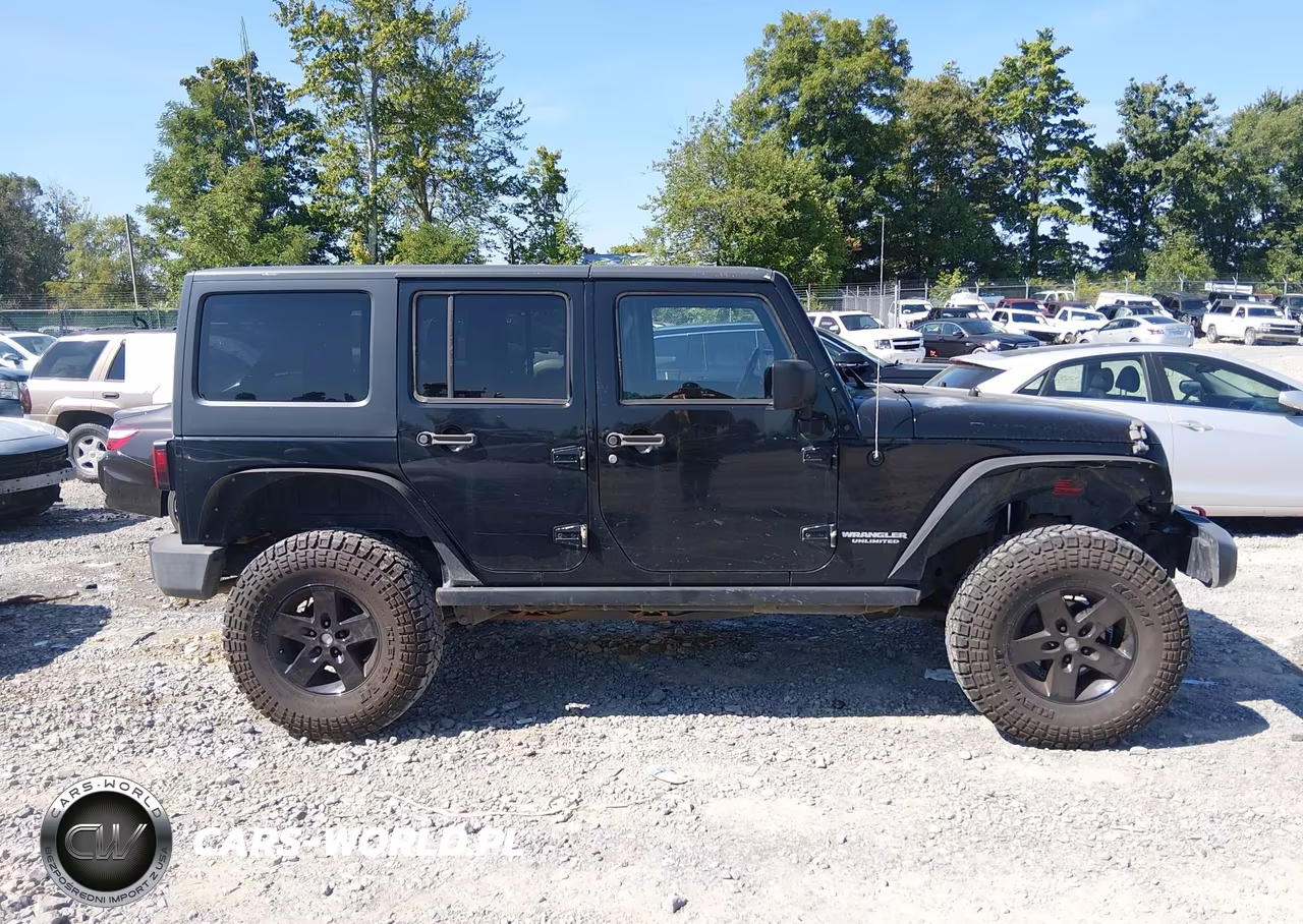 2012 Jeep Wrangler Unlimited Rubicon VIN:1C4BJWFG1CL261086 - 13