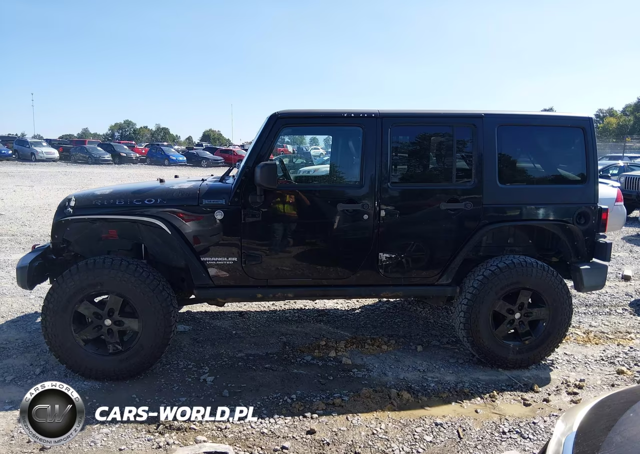 2012 Jeep Wrangler Unlimited Rubicon VIN:1C4BJWFG1CL261086 - 14
