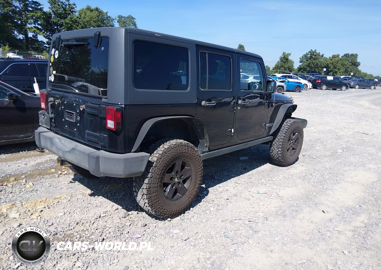 2012 Jeep Wrangler Unlimited Rubicon VIN:1C4BJWFG1CL261086 - 4