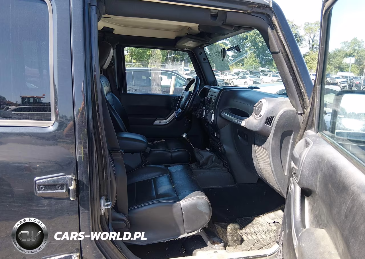 2012 Jeep Wrangler Unlimited Rubicon VIN:1C4BJWFG1CL261086 - 5