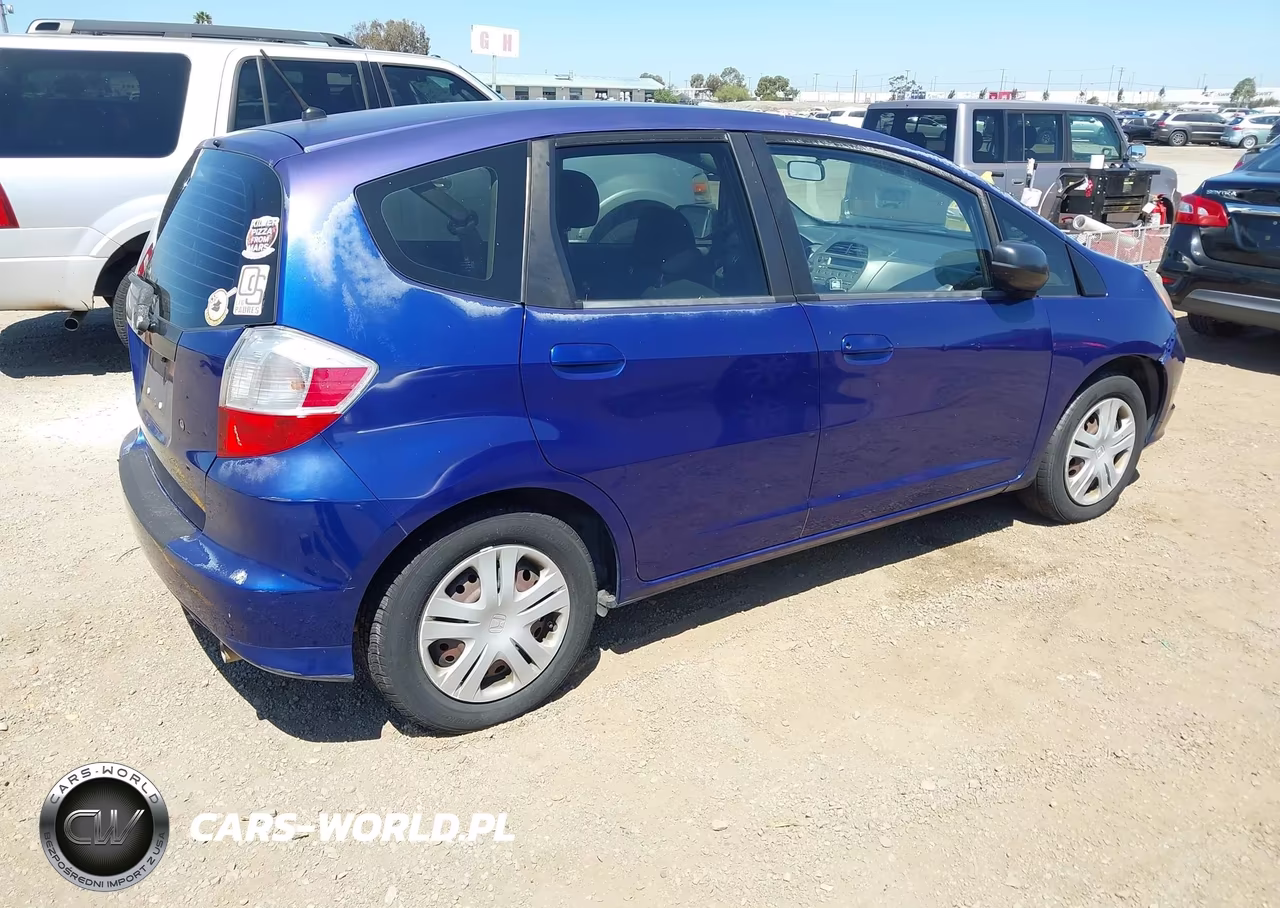 2009 Honda Fit VIN:JHMGE87259S059907 - 4