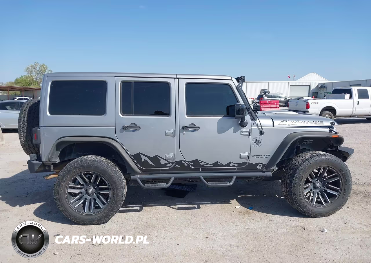 2015 Jeep Wrangler Unlimited Altitude VIN:1C4BJWEG3FL708152 - 13