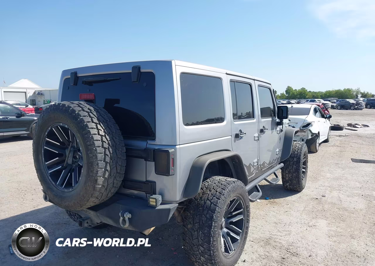 2015 Jeep Wrangler Unlimited Altitude VIN:1C4BJWEG3FL708152 - 4