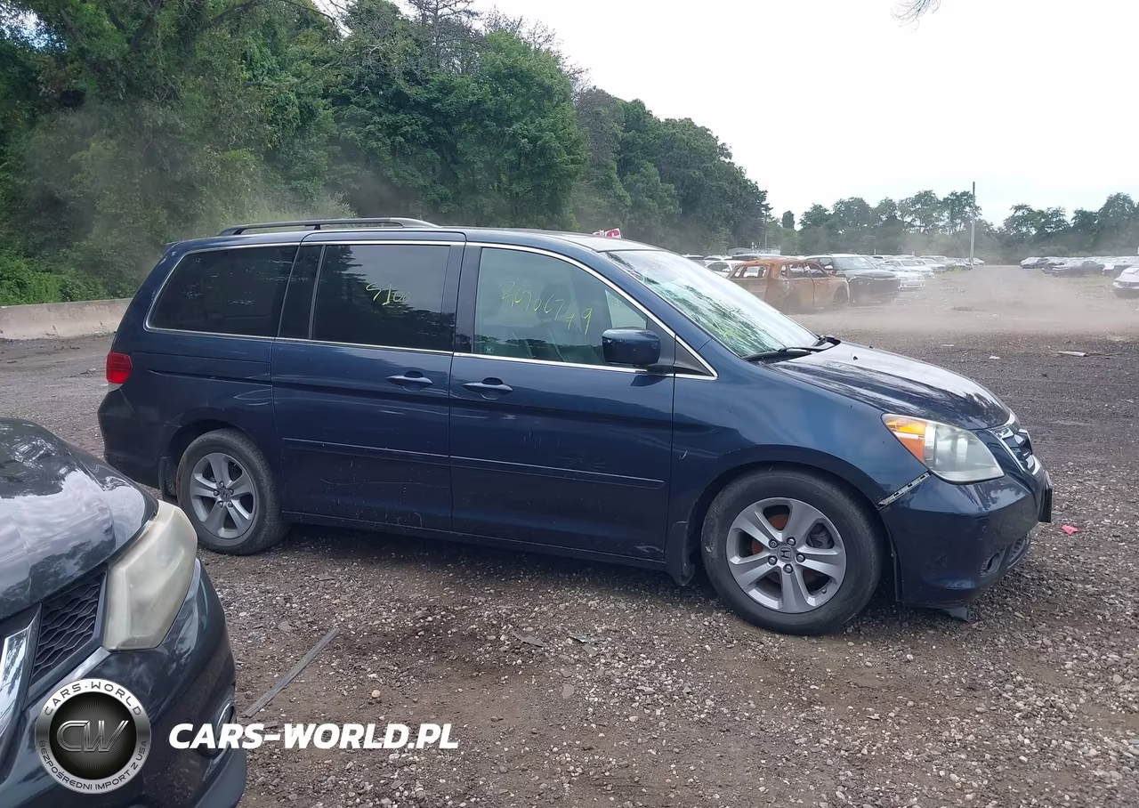 2010 Honda Odyssey Touring VIN:5FNRL3H92AB001897 - 12