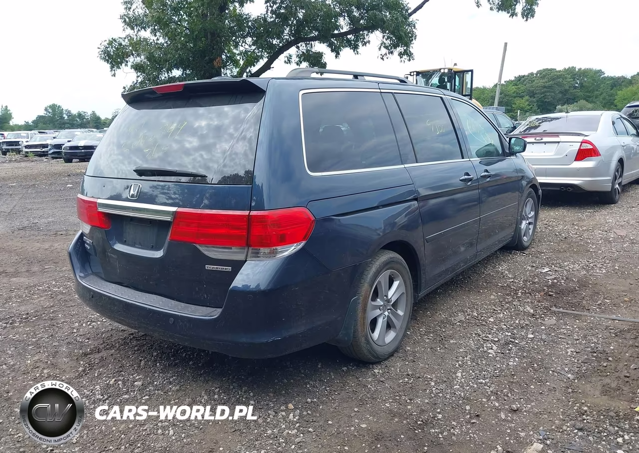 2010 Honda Odyssey Touring VIN:5FNRL3H92AB001897 - 4