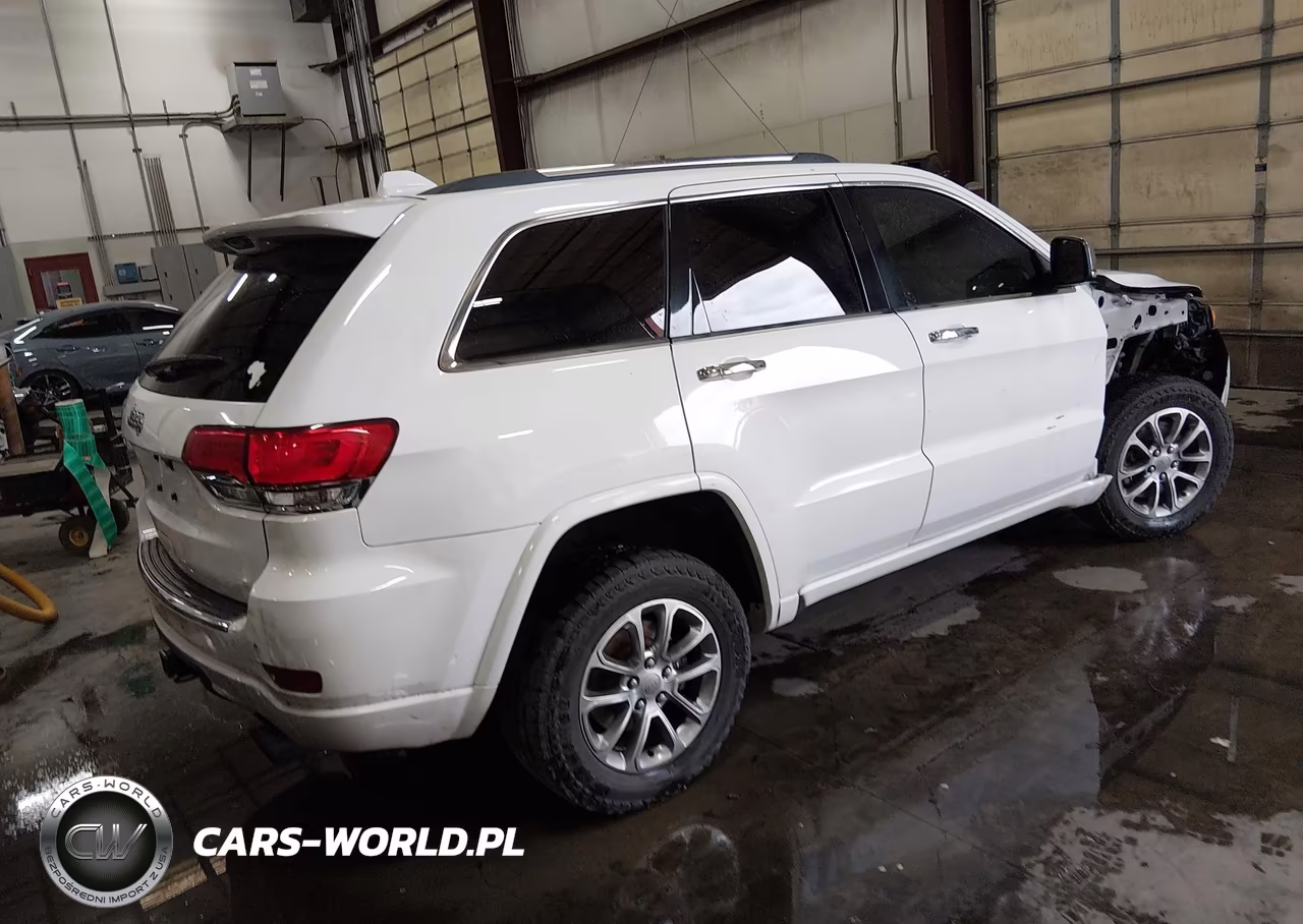 2015 Jeep Grand Cherokee Overland VIN:1C4RJFCM5FC757053 - 4