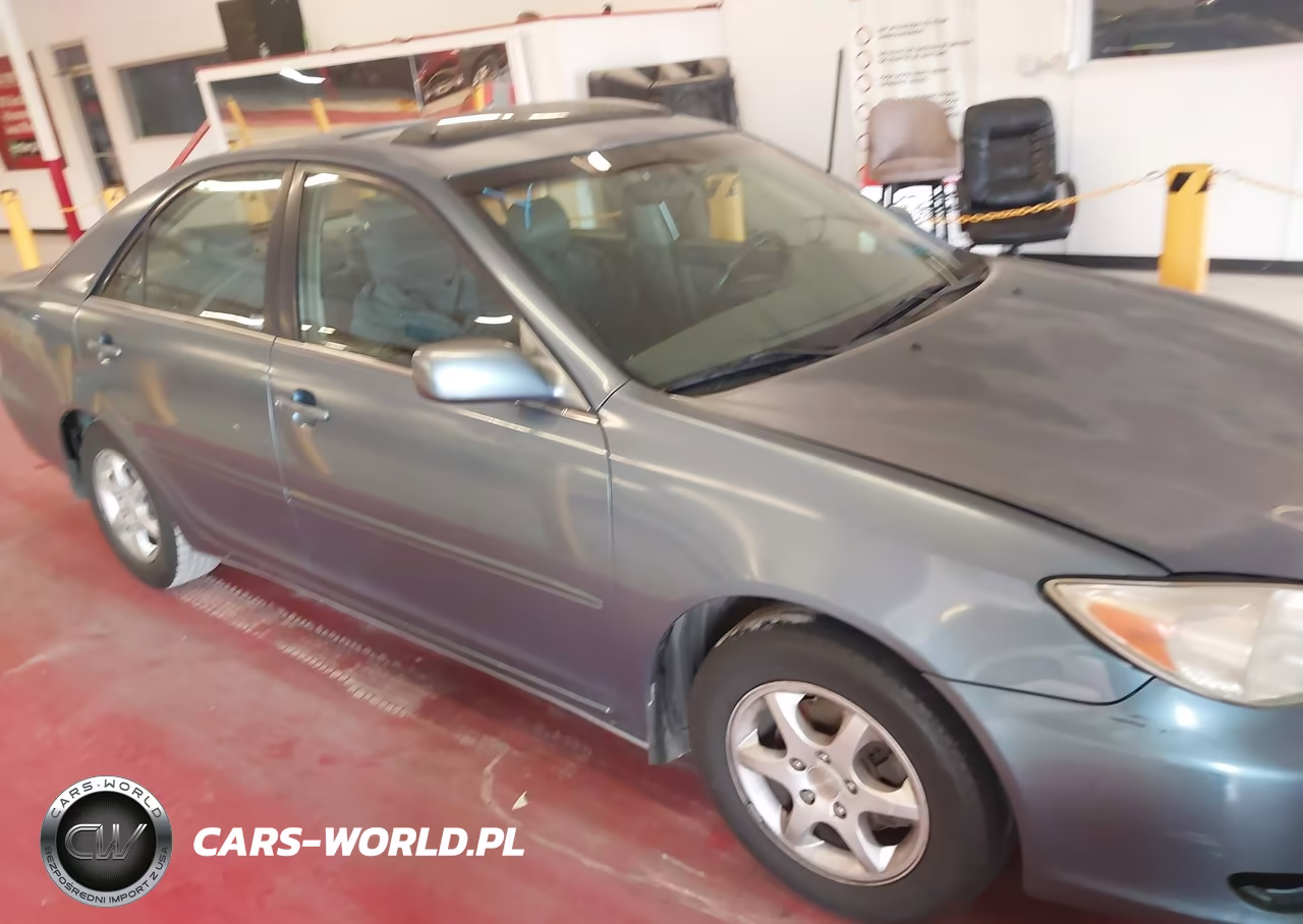 2002 Toyota Camry Le VIN:JTDBE30K320019996 - 13