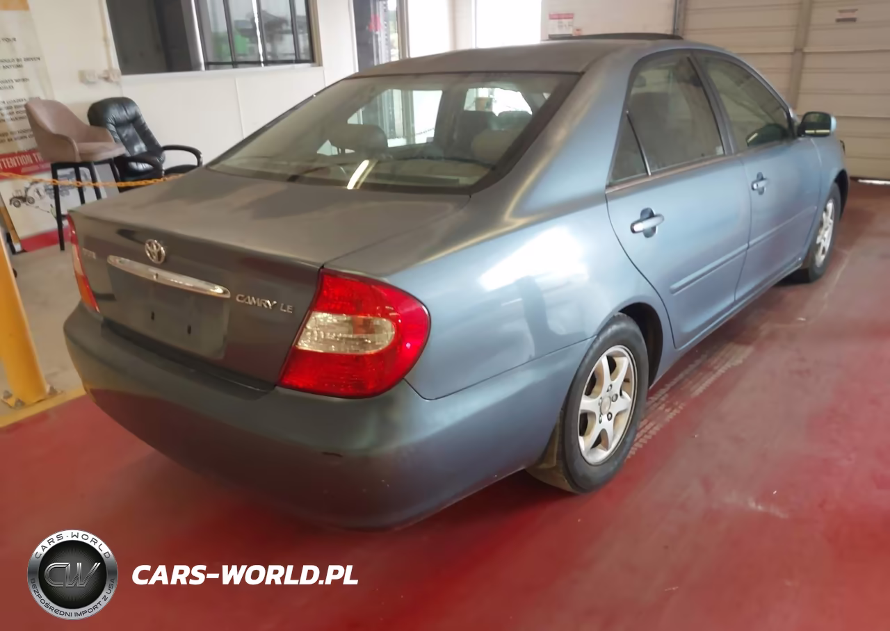 2002 Toyota Camry Le VIN:JTDBE30K320019996 - 4