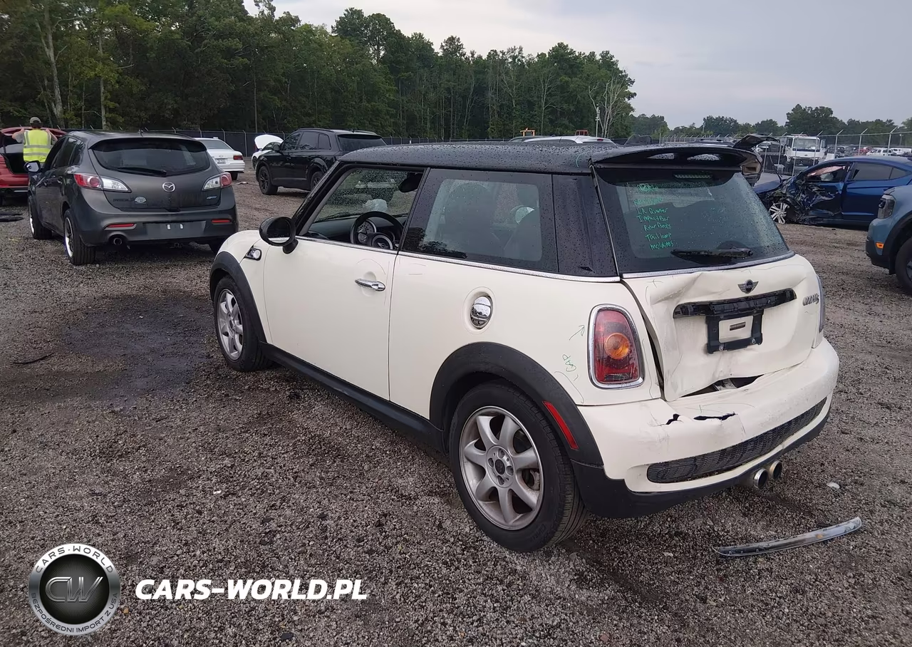 2010 Mini Cooper S VIN:WMWMF7C55ATW88557 - 3
