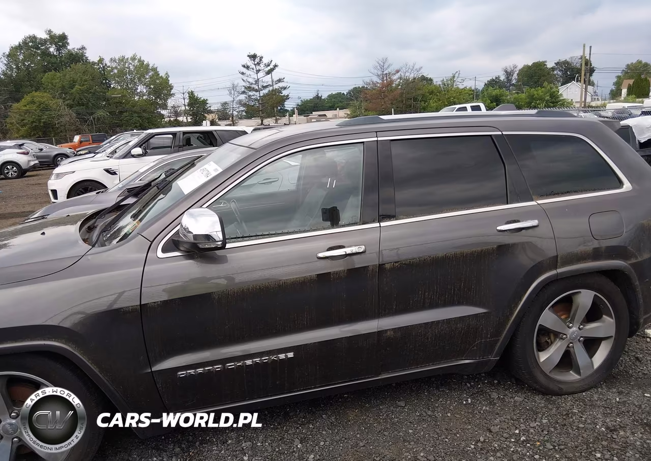 2015 Jeep Grand Cherokee Overland VIN:1C4RJFCG4FC609857 - 14
