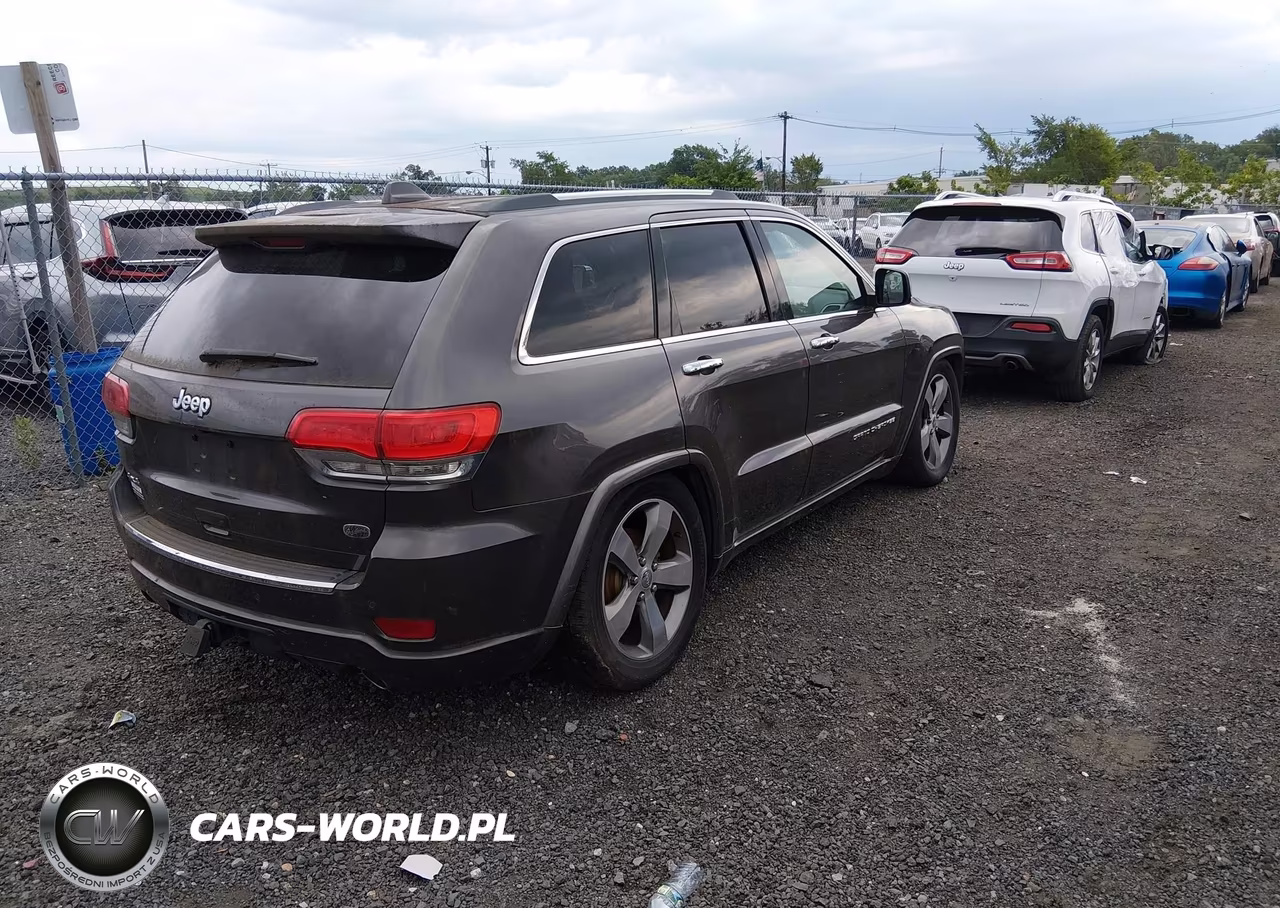 2015 Jeep Grand Cherokee Overland VIN:1C4RJFCG4FC609857 - 4