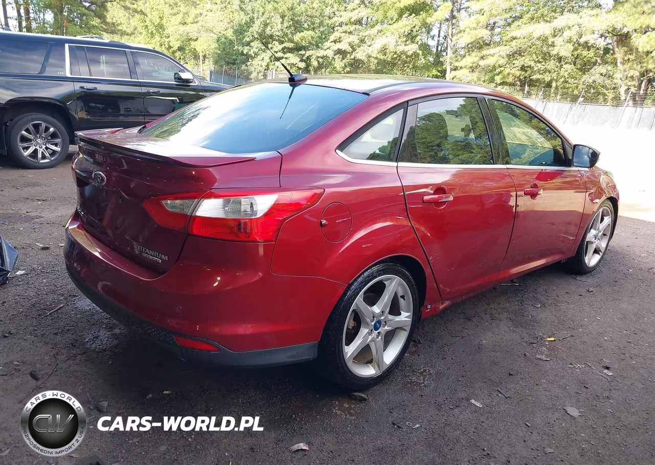 2014 Ford Focus Titanium VIN:1FADP3J21EL173293 - 4