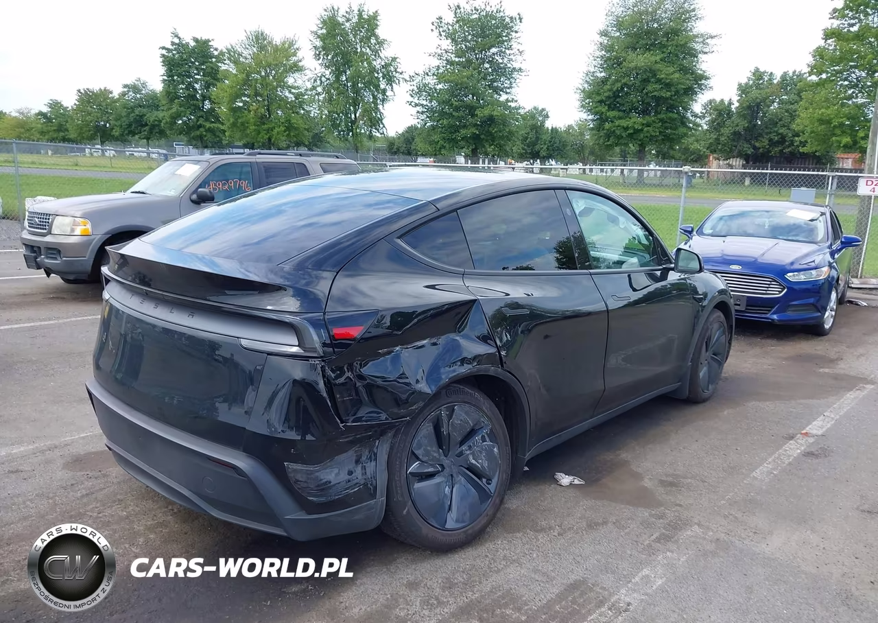 2026 Tesla Model Y Premium-Rear-Wheel Drive VIN:7SAYGDEDXTF581677 - 4