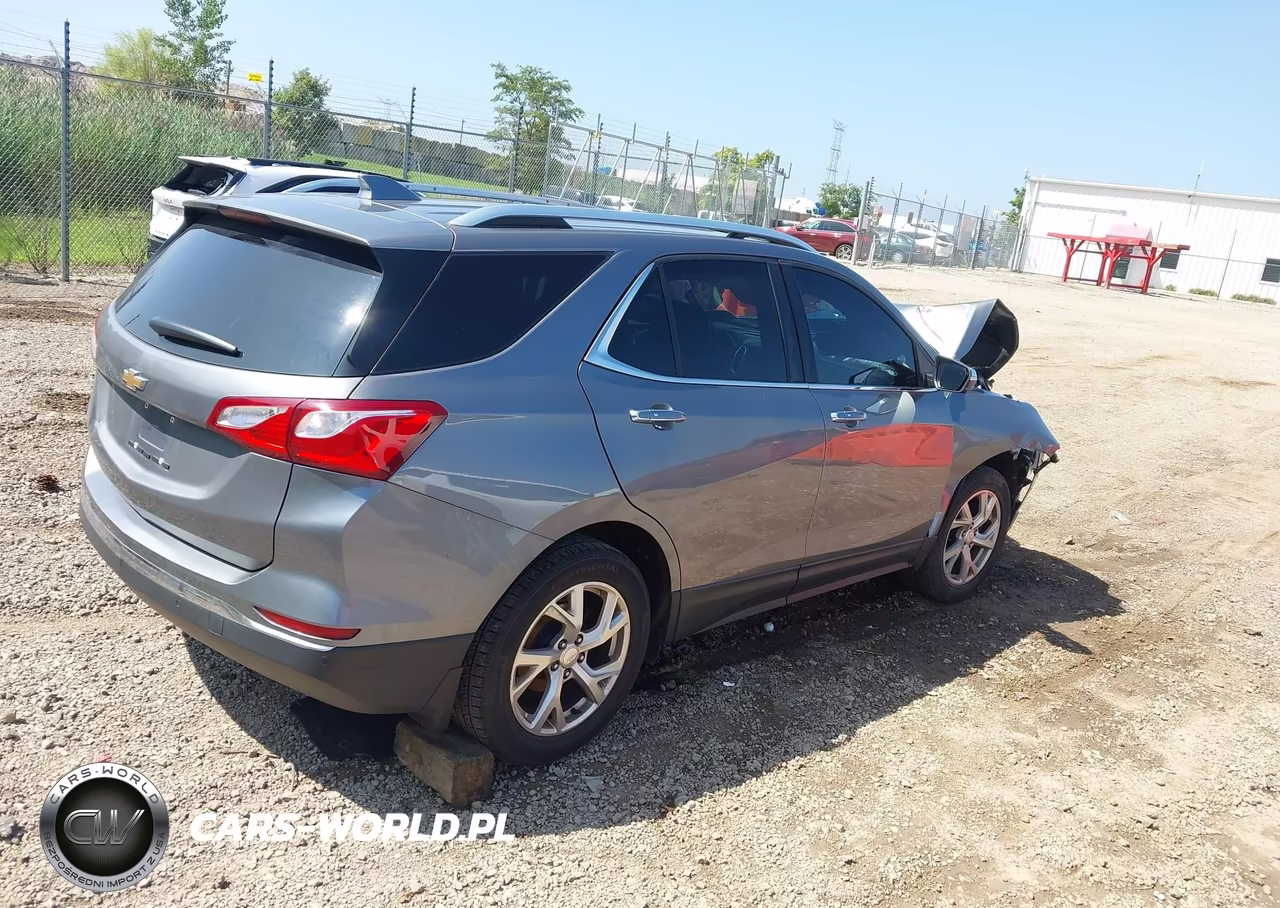 2018 Chevrolet Equinox Premier VIN:3GNAXVEV6JL179352 - 4