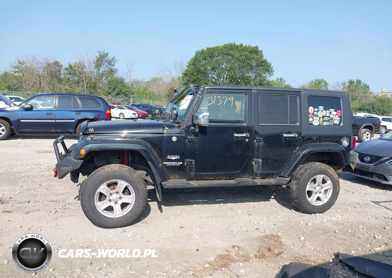 2010 Jeep Wrangler Unlimited Sahara VIN:1J4HA5H19AL146059 - 14