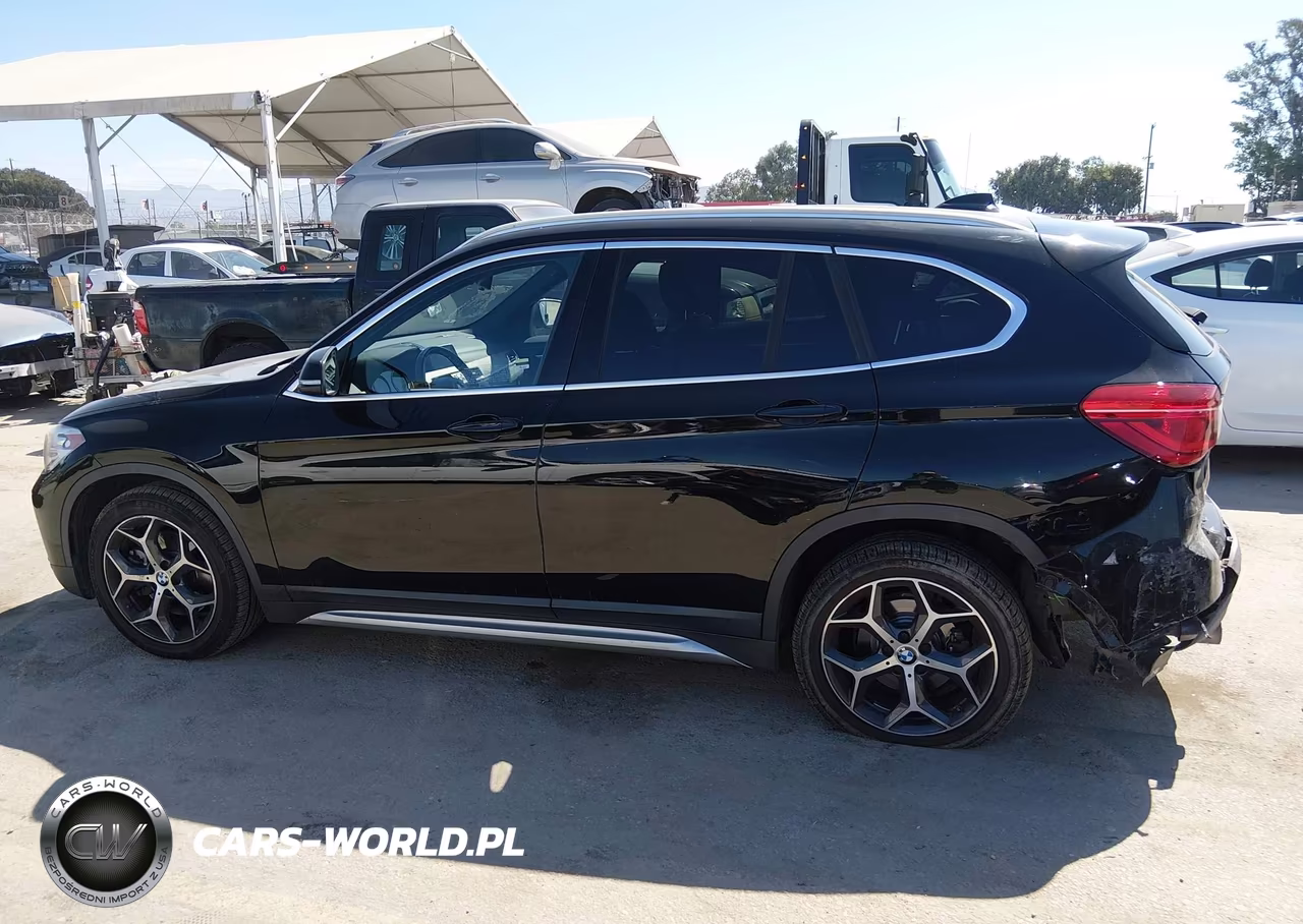 2019 BMW X1 Sdrive28I VIN:WBXHU7C5XK5L11077 - 14