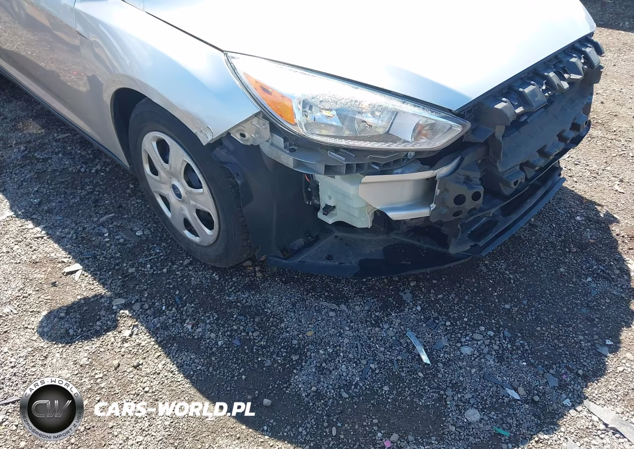 2018 Ford Focus S VIN:1FADP3E23JL277000 - 12