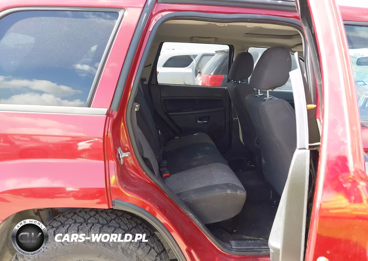 2009 Jeep Grand Cherokee Laredo VIN:1J8GR48K49C549500 - 8