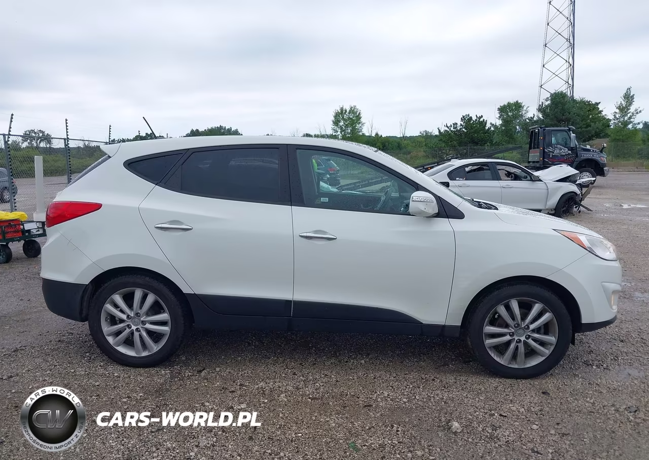 2011 Hyundai Tucson Limited VIN:KM8JUCAC4BU170923 - 13