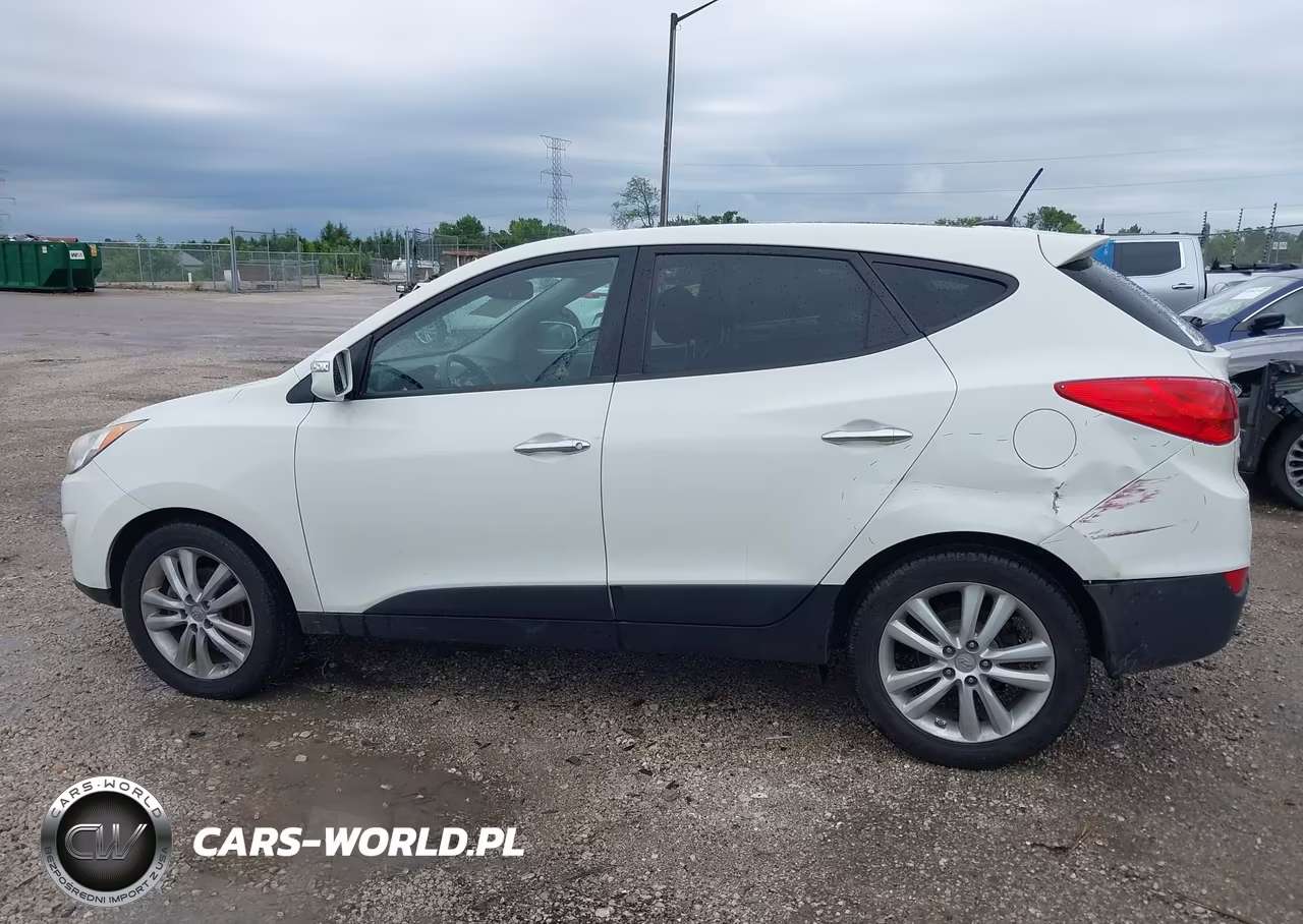 2011 Hyundai Tucson Limited VIN:KM8JUCAC4BU170923 - 14