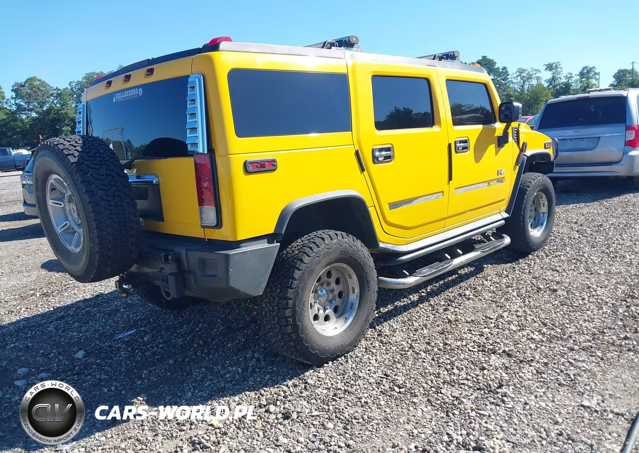 2003 Hummer H2 VIN:5GRGN23UX3H112187 - 4