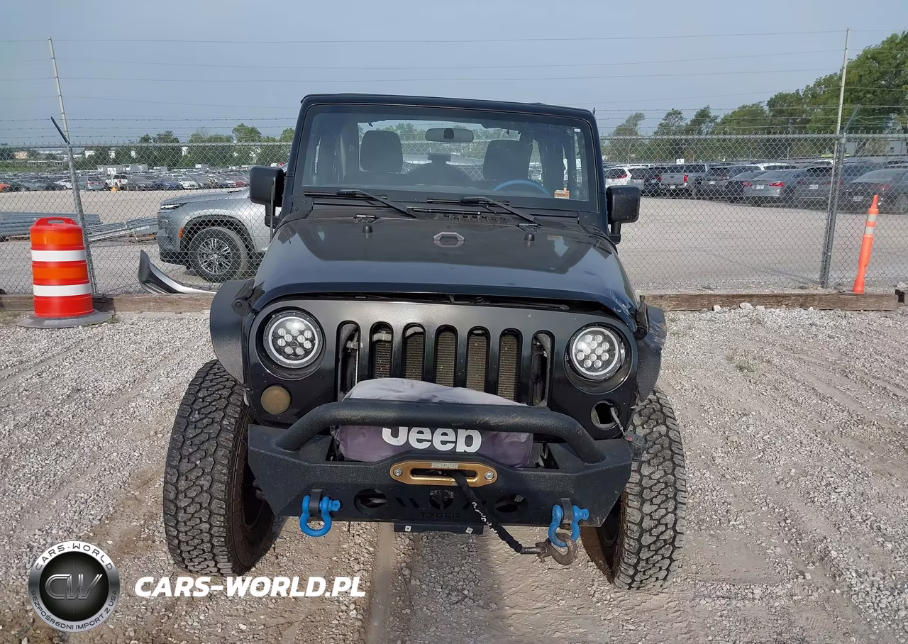 2011 Jeep Wrangler Sport VIN:1J4AA2D16BL526709 - 12