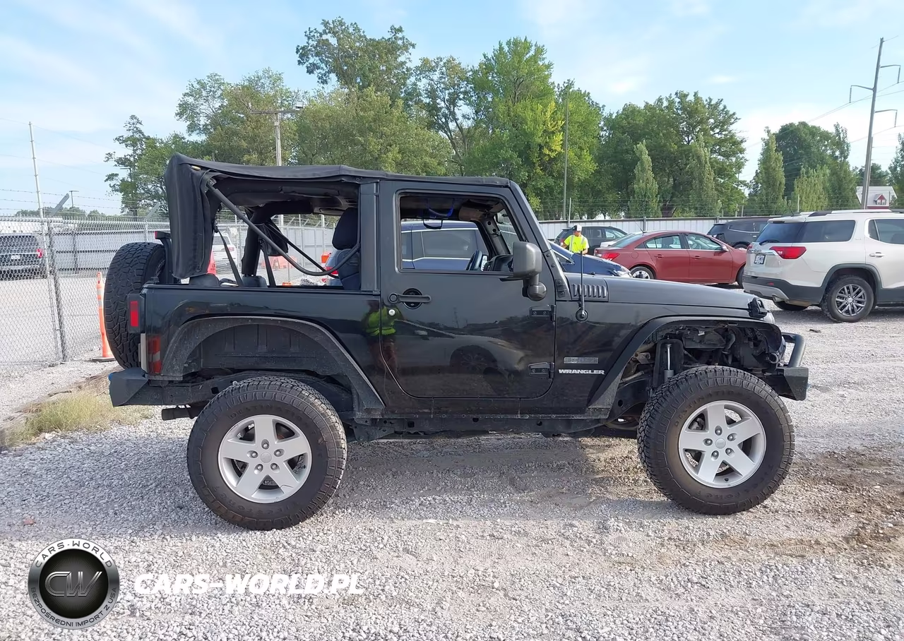 2011 Jeep Wrangler Sport VIN:1J4AA2D16BL526709 - 13