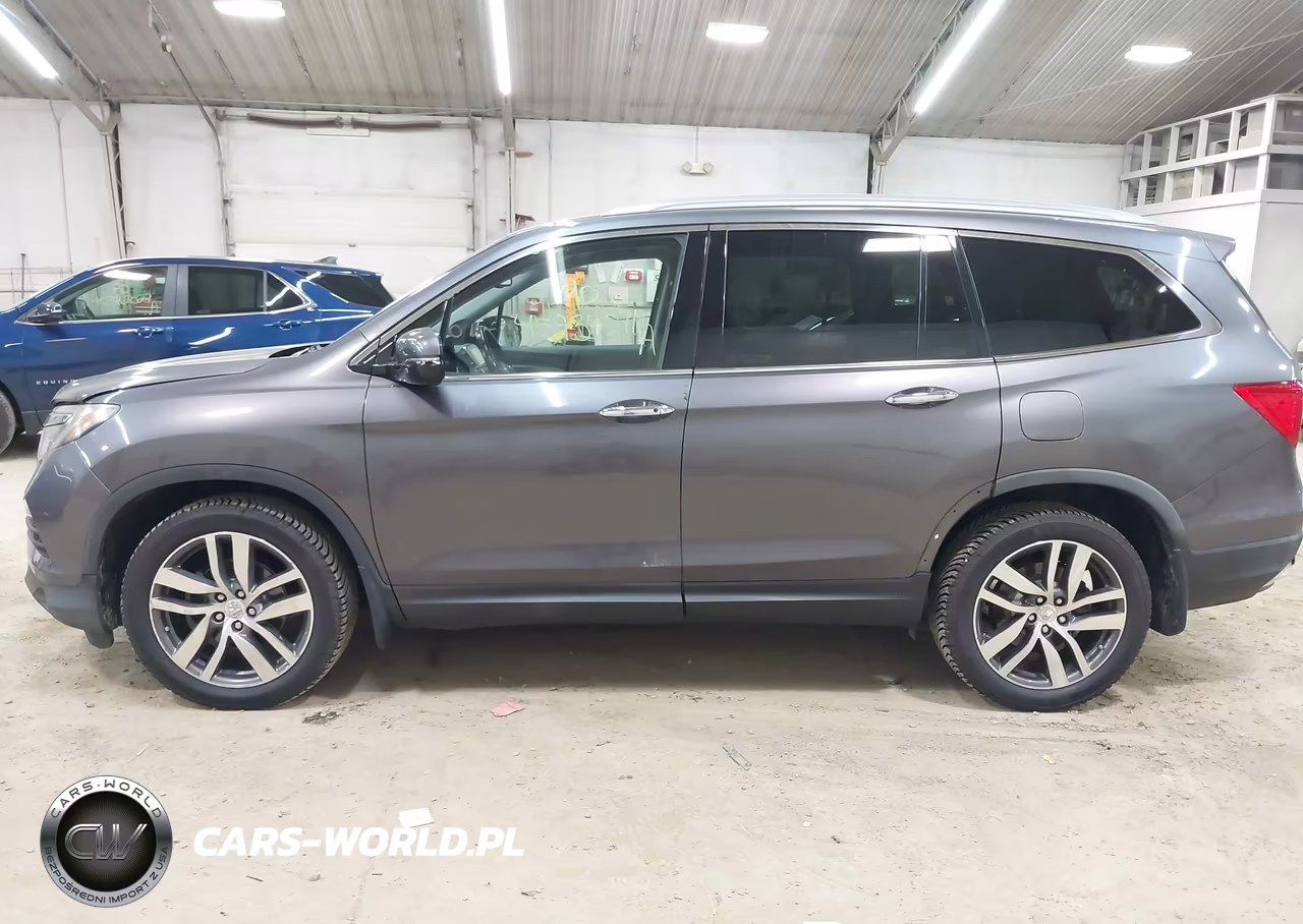 2016 Honda Pilot Elite VIN:5FNYF6H06GB030317 - 14