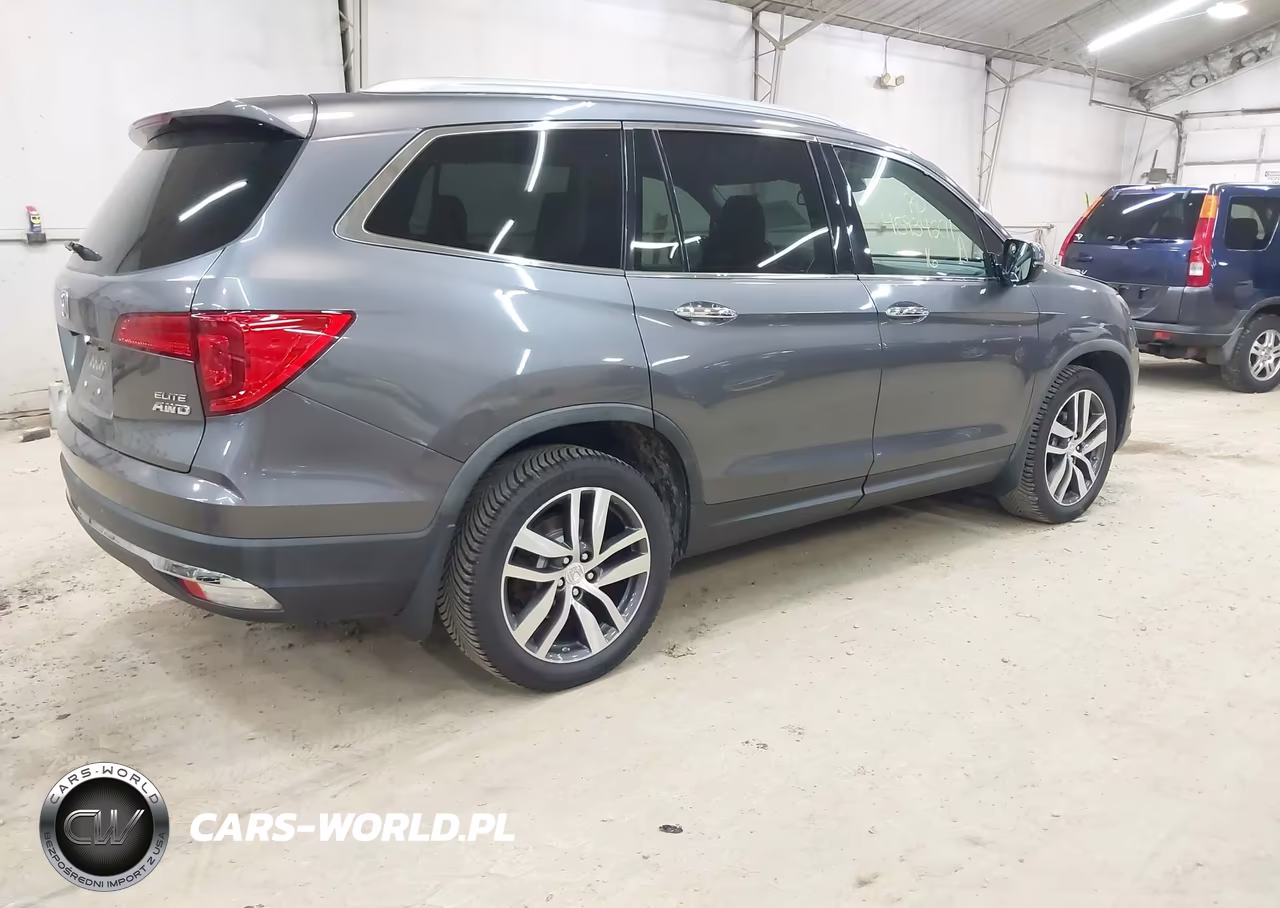 2016 Honda Pilot Elite VIN:5FNYF6H06GB030317 - 4