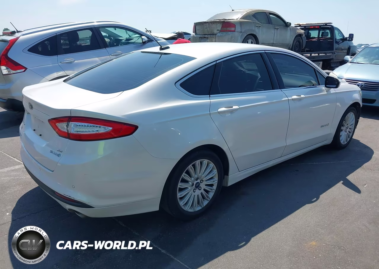 2015 Ford Fusion Hybrid Se VIN:3FA6P0LUXFR123338 - 4