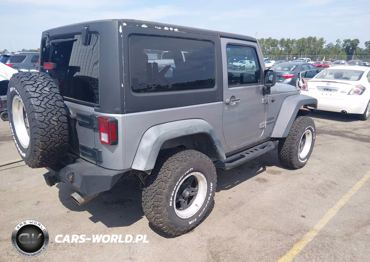 2013 Jeep Wrangler Sport VIN:1C4AJWAG0DL575073 - 4