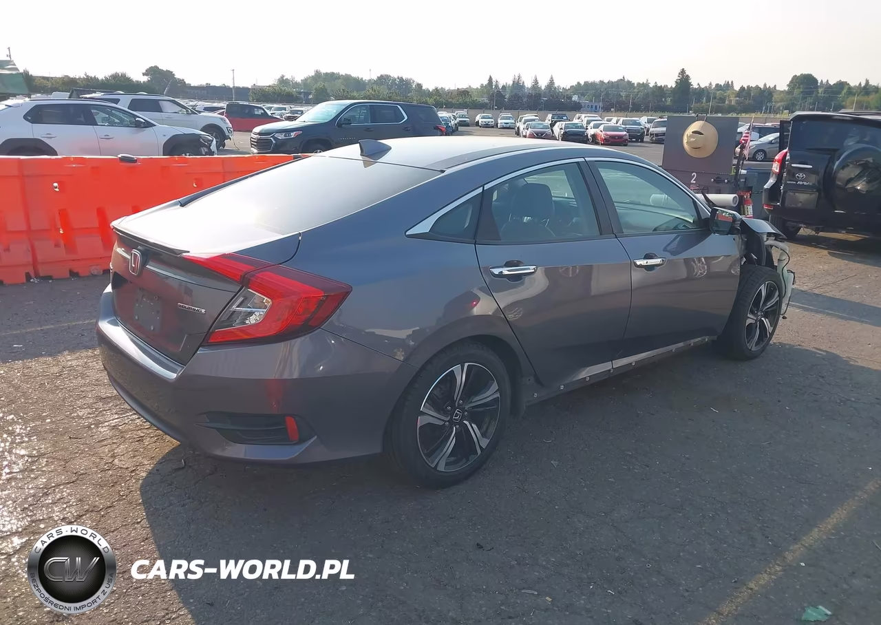 2017 Honda Civic Touring VIN:2HGFC1F94HH642260 - 4