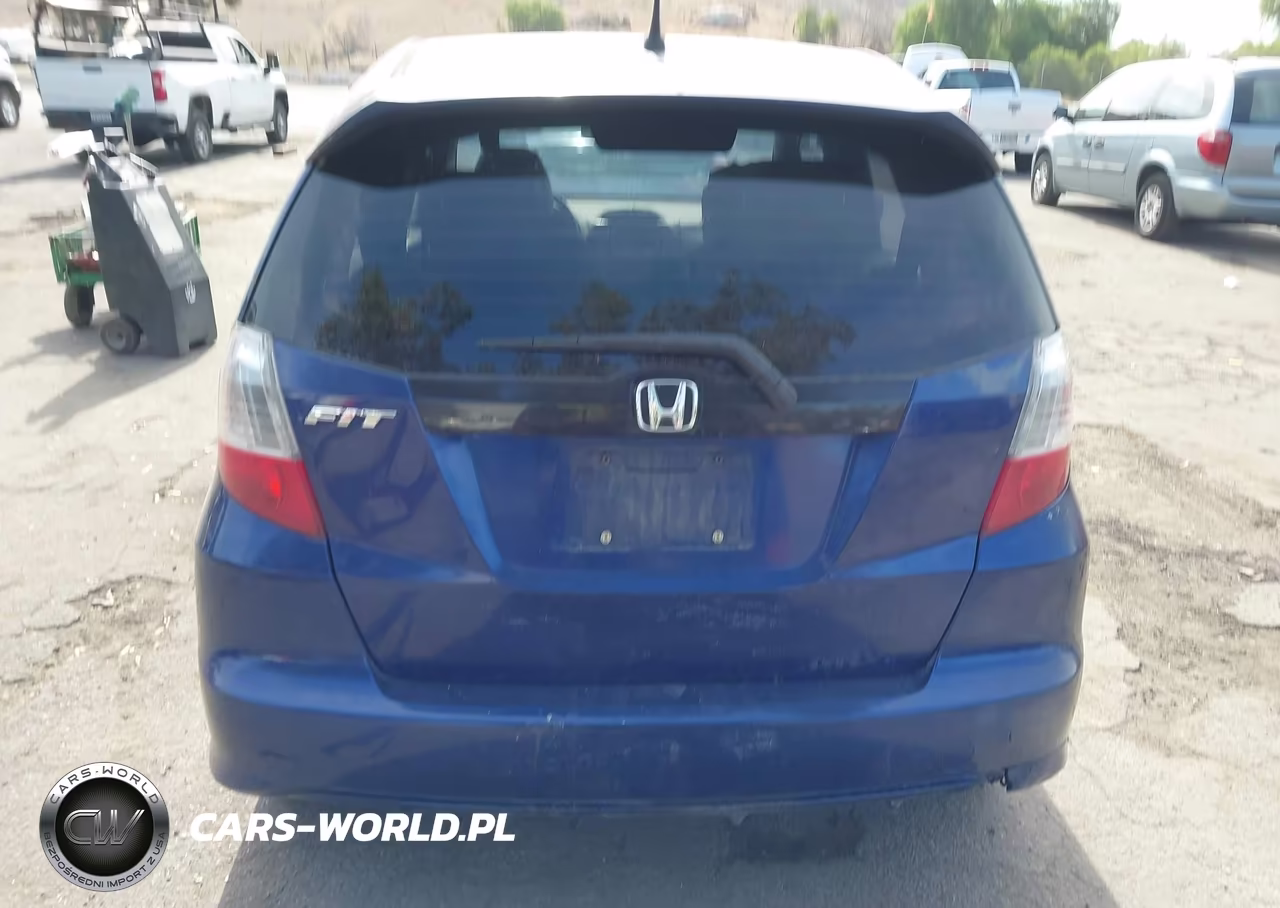 2013 Honda Fit Sport VIN:JHMGE8H69DC059123 - 16