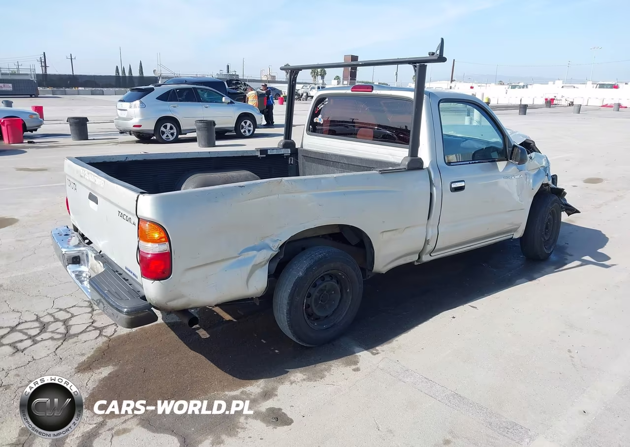 2000 Toyota Tacoma VIN:5TENL42N5YZ700220 - 4