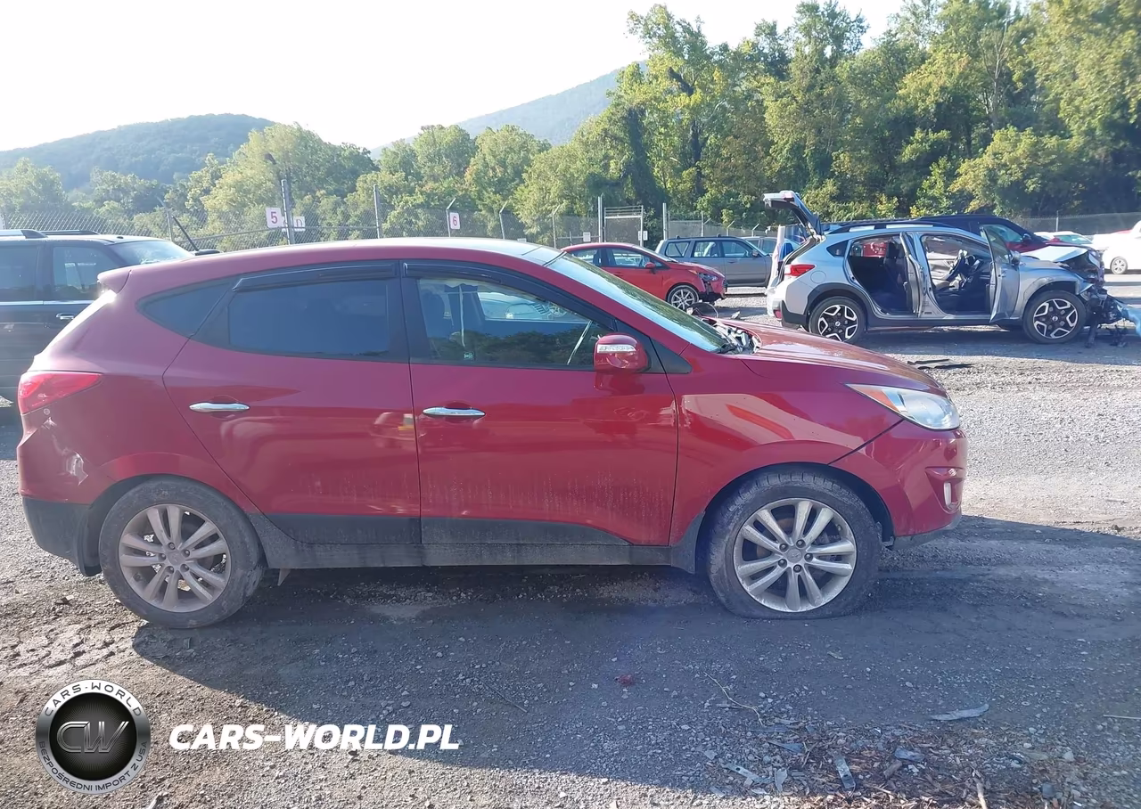 2011 Hyundai Tucson Limited VIN:KM8JU3AC7BU142517 - 13