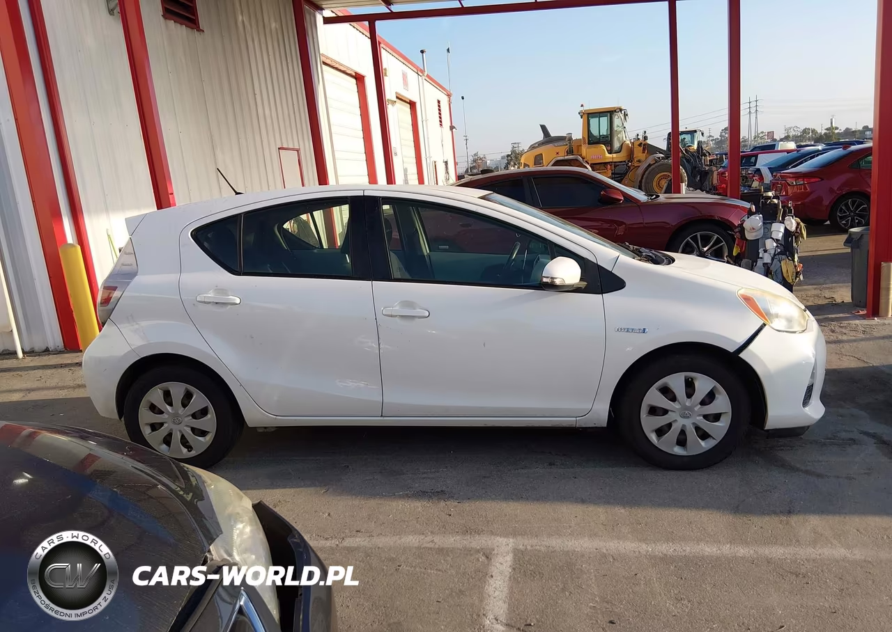 2012 Toyota Prius C Two VIN:JTDKDTB3XC1509422 - 13