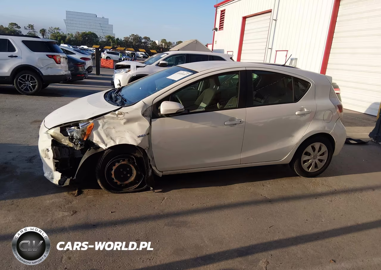 2012 Toyota Prius C Two VIN:JTDKDTB3XC1509422 - 14