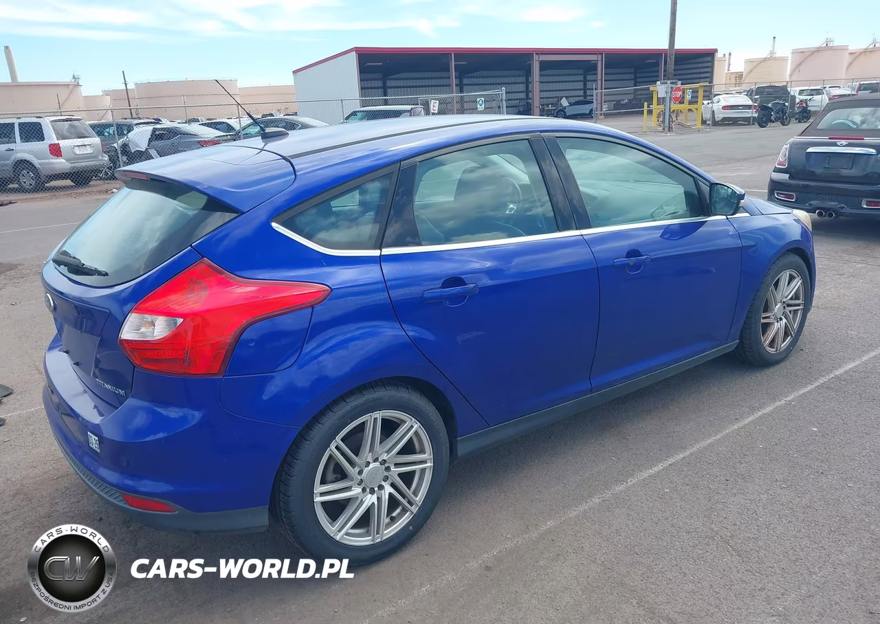 2014 Ford Focus Titanium VIN:1FADP3N21EL123942 - 4