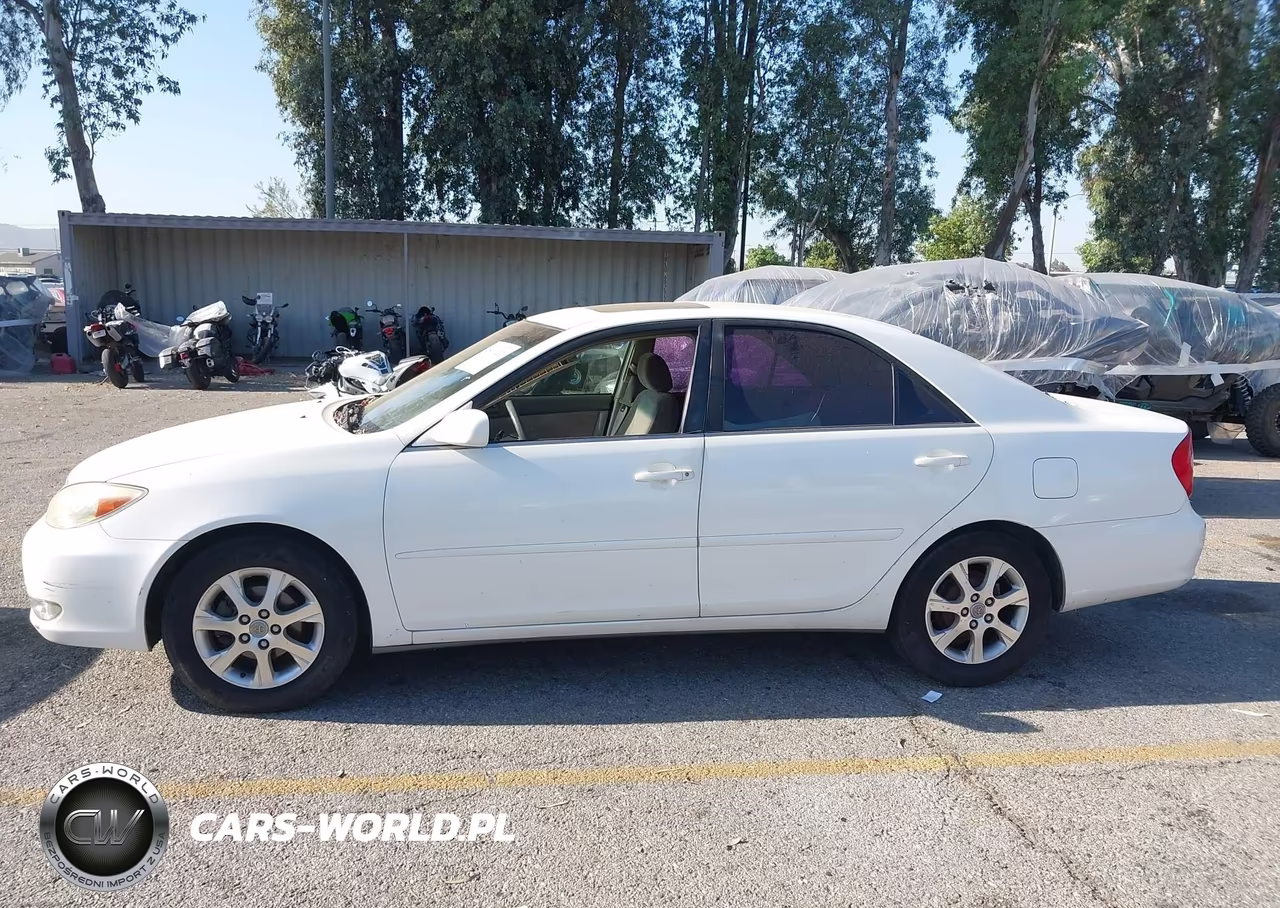 2004 Toyota Camry Le VIN:JTDBE32K440279565 - 14