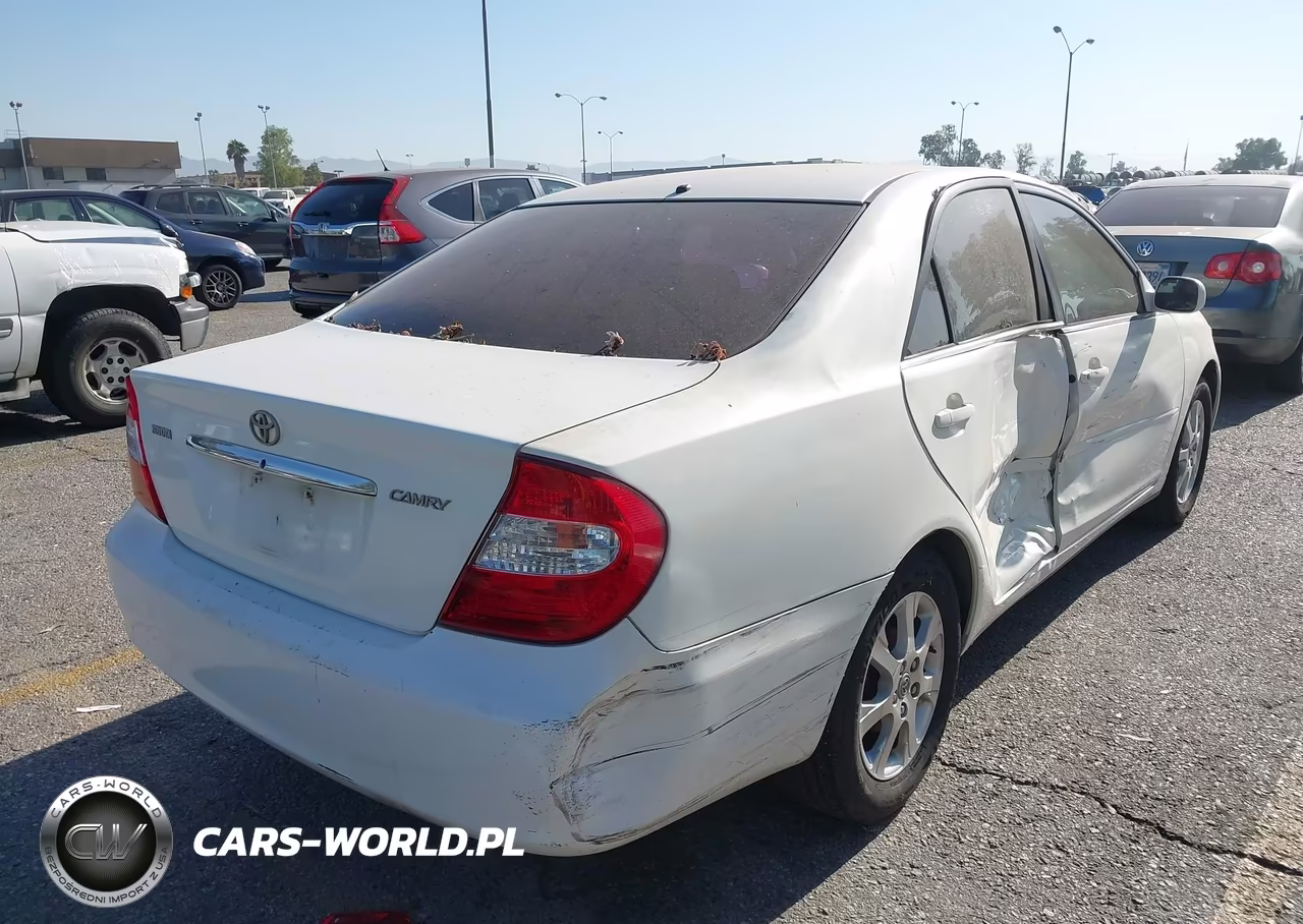 2004 Toyota Camry Le VIN:JTDBE32K440279565 - 4