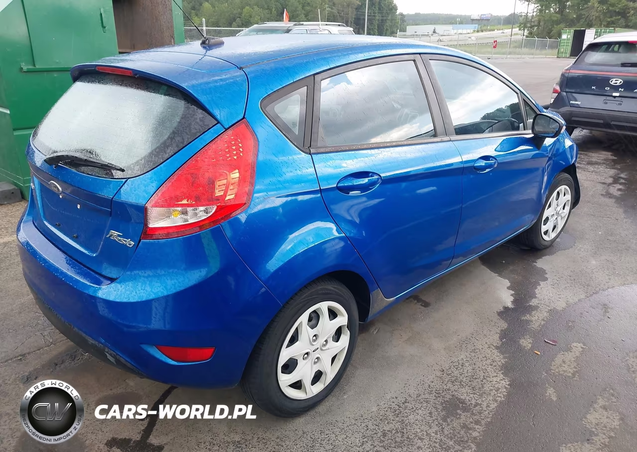 2011 Ford Fiesta Ses VIN:3FADP4FJ8BM129176 - 4