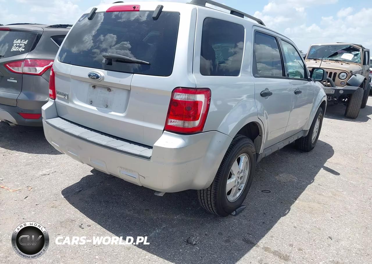 2009 Ford Escape Xlt VIN:1FMCU03G59KA30618 - 4