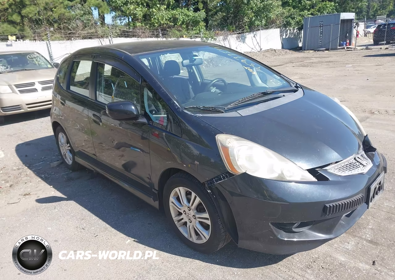 2011 Honda Fit Sport VIN:JHMGE8H55BC004558 - 1