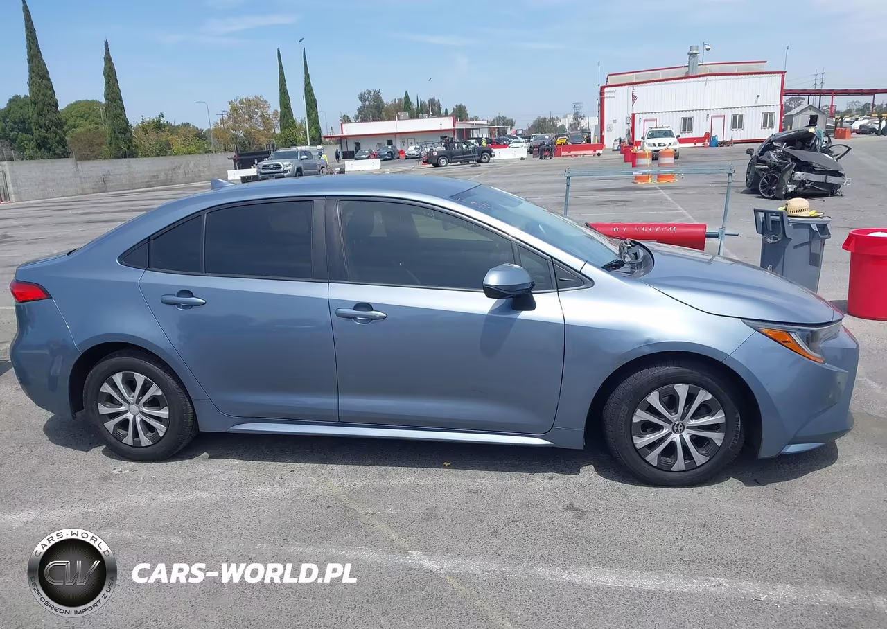 2022 Toyota Corolla Hybrid Le VIN:JTDEAMDE7NJ054493 - 12