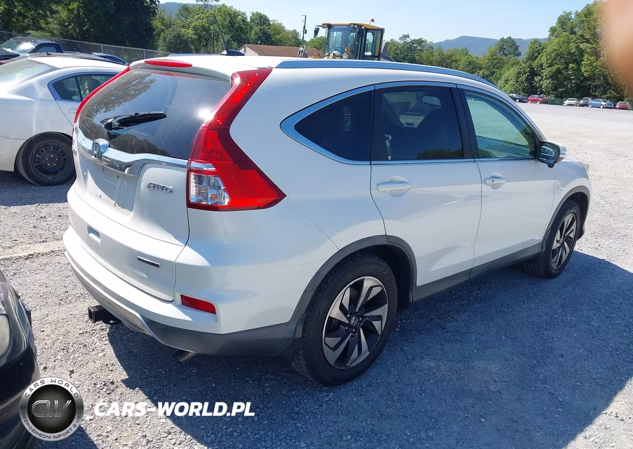 2015 Honda Cr-V Touring VIN:5J6RM4H90FL096395 - 4