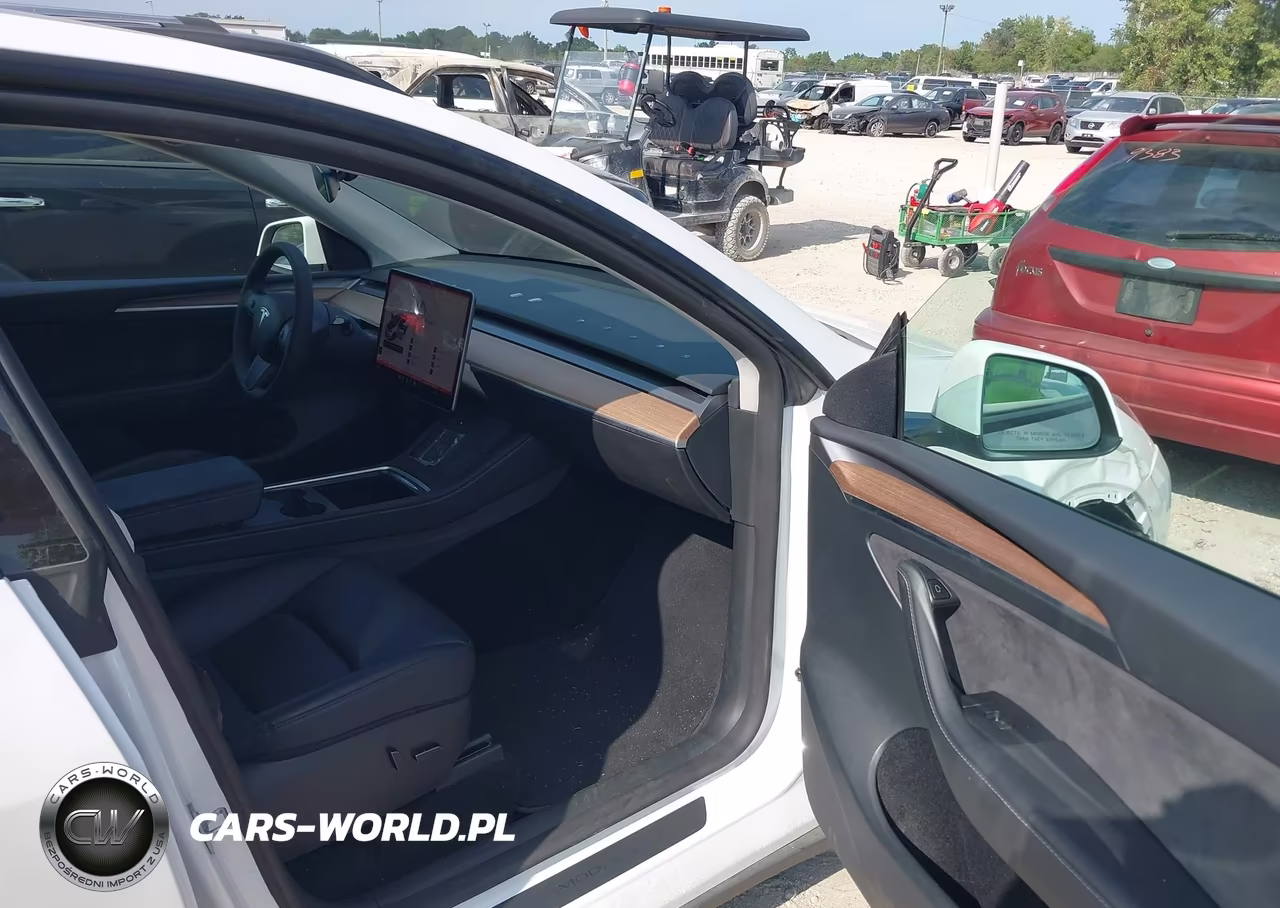 2023 Tesla Model Y Performance Dual Motor All-Wheel Drive VIN:7SAYGDEF2PF830724 - 5