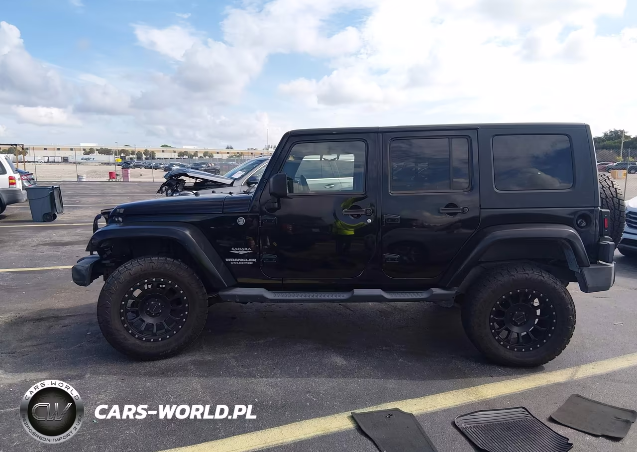 2009 Jeep Wrangler Unlimited Sahara VIN:1J4GA59189L762177 - 14
