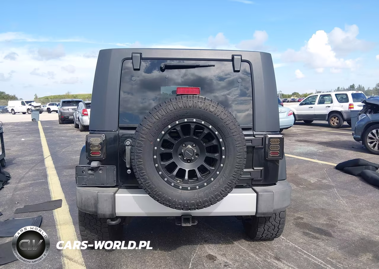 2009 Jeep Wrangler Unlimited Sahara VIN:1J4GA59189L762177 - 16
