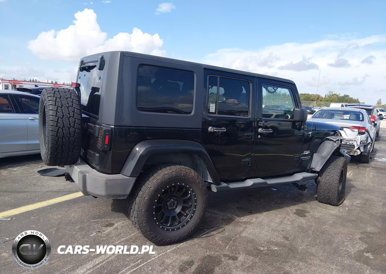 2009 Jeep Wrangler Unlimited Sahara VIN:1J4GA59189L762177 - 4